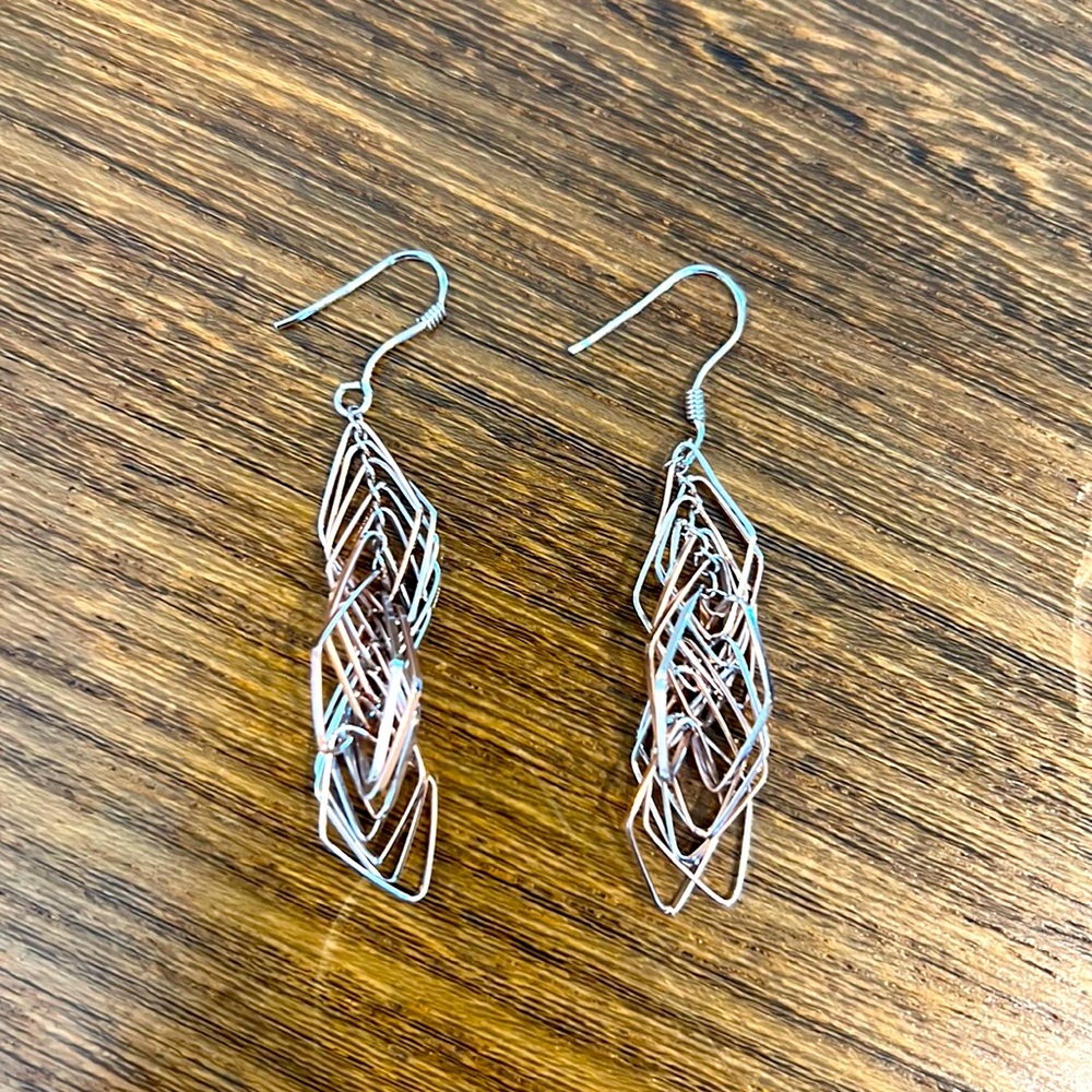 Silver and rose gold tone earrings